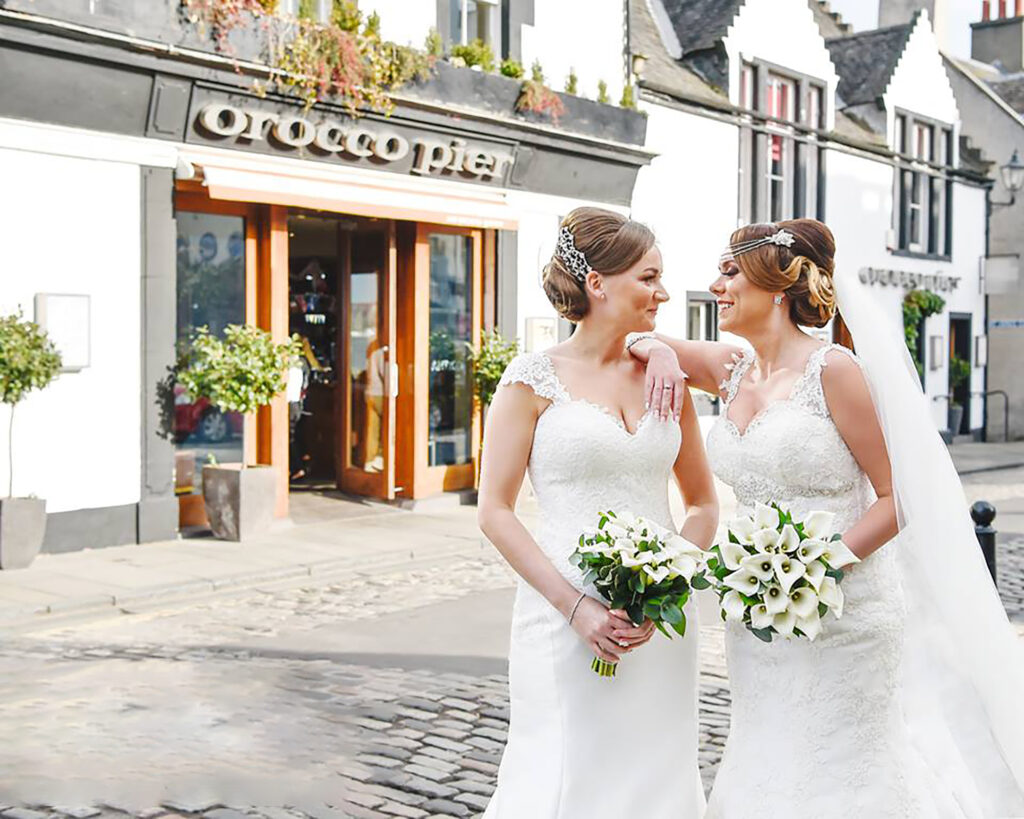 Ashley & Paula outside main doors